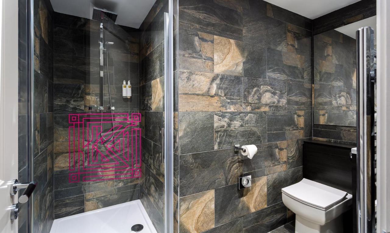 Kotel Windermere Extérieur photo A shower enclosure
