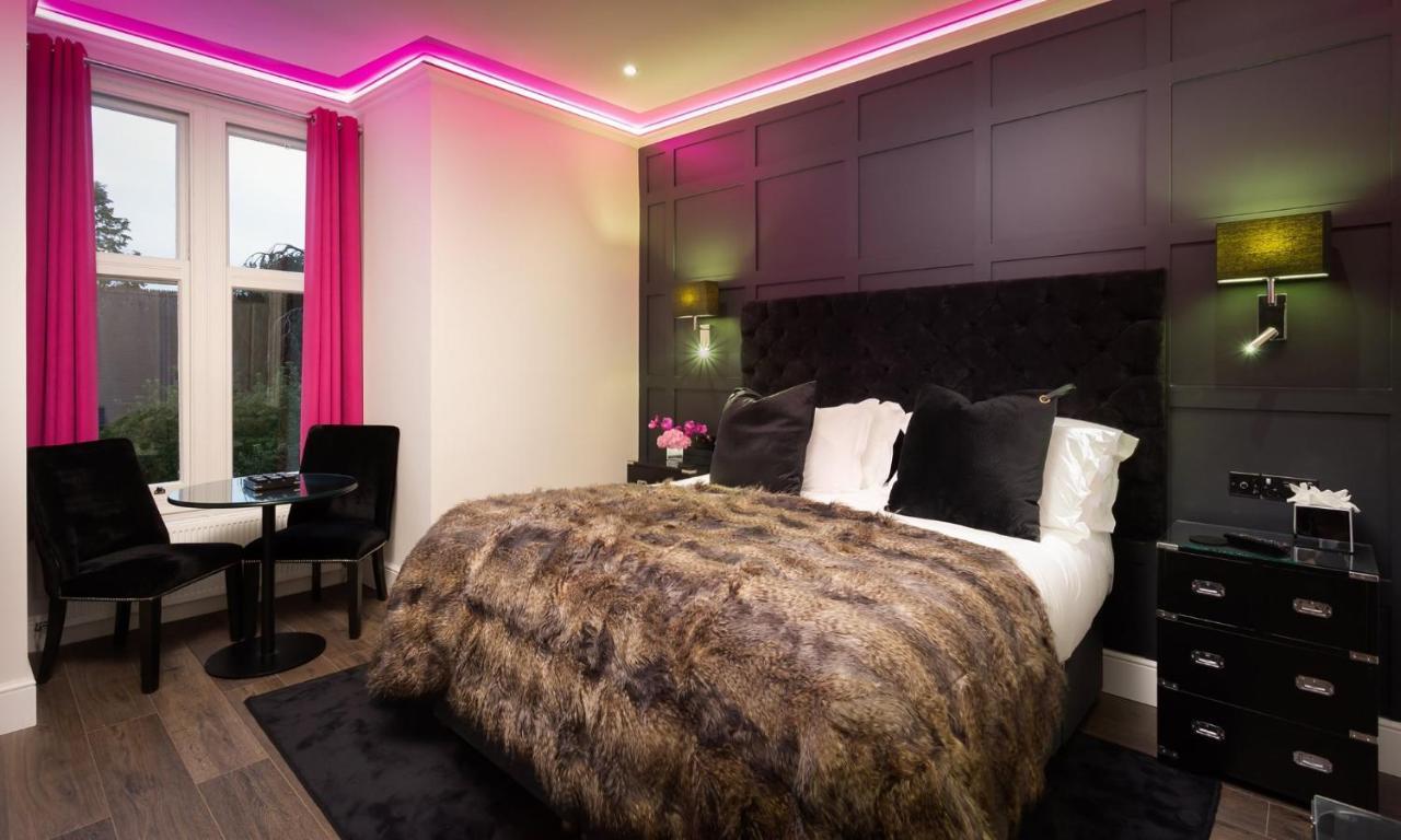 Kotel Windermere Extérieur photo A bedroom at The Ivy Hotel